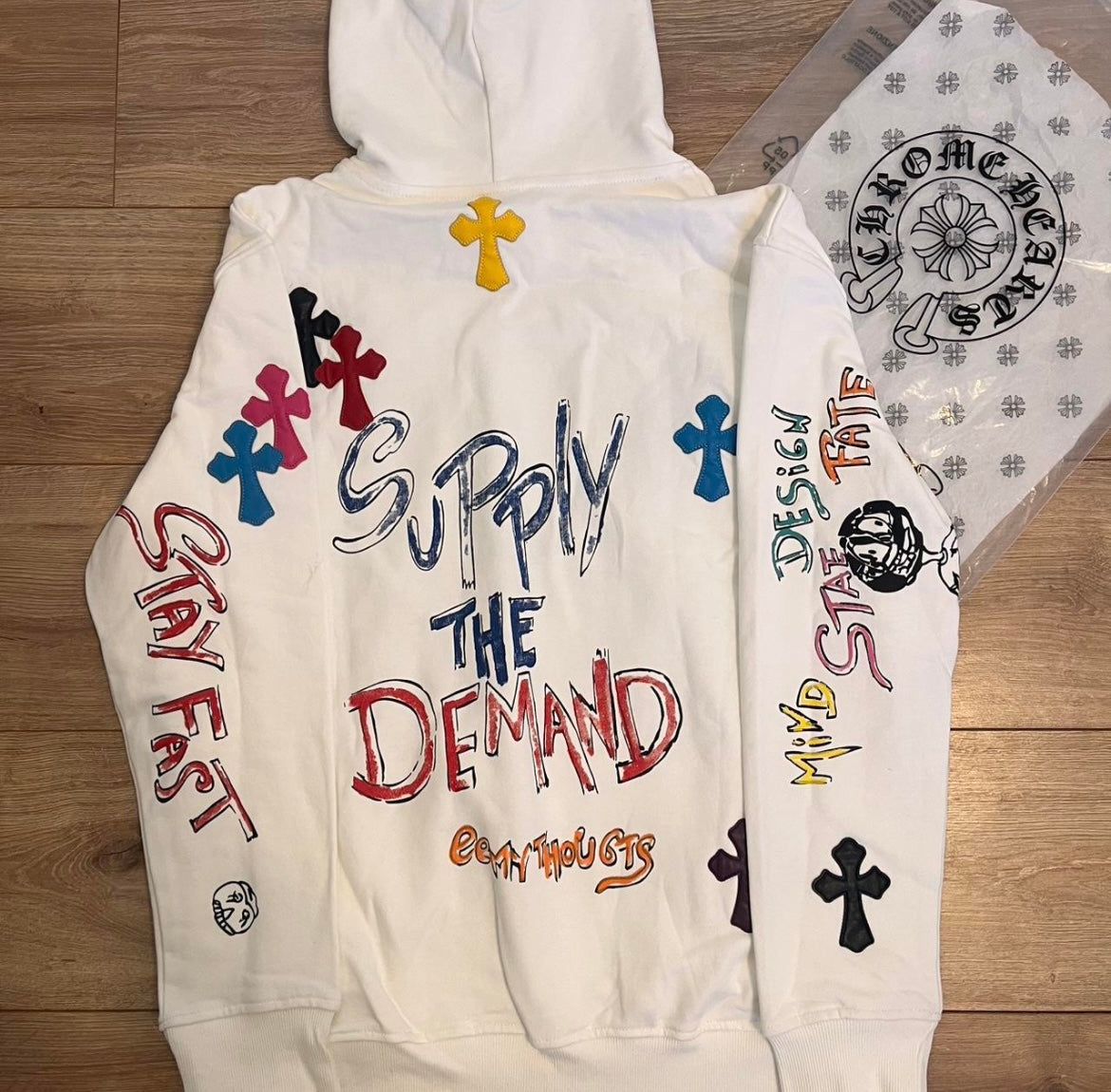 supply the demand colorful cross graphic hoodie